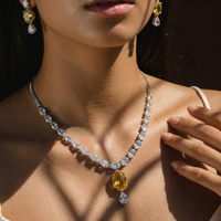Elegant Yellow Crystal Drop Earrings & Silver Zircon Necklace