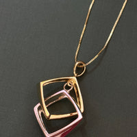 Elegant Dual Tone Geometric Pendant Necklace