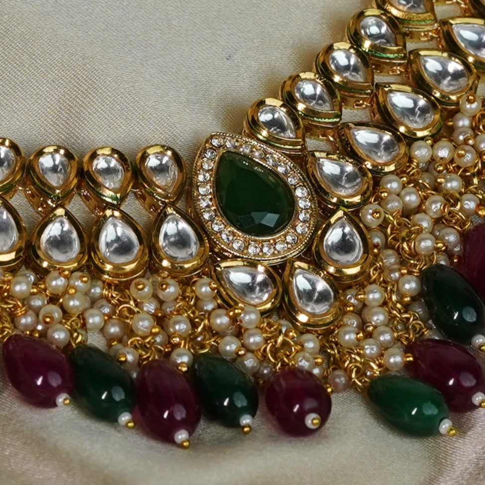 Stunning Green and Red Kundan Jewelry - Timeless Elegance" - Mivanaa