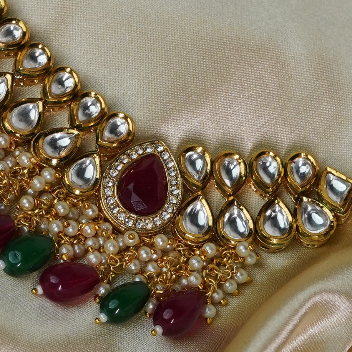 Stunning Green and Red Kundan Jewelry - Timeless Elegance" - Mivanaa